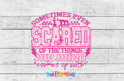 Sometimes Even I'm Scared pink letters UV DTF transfer artwork on a white wood background