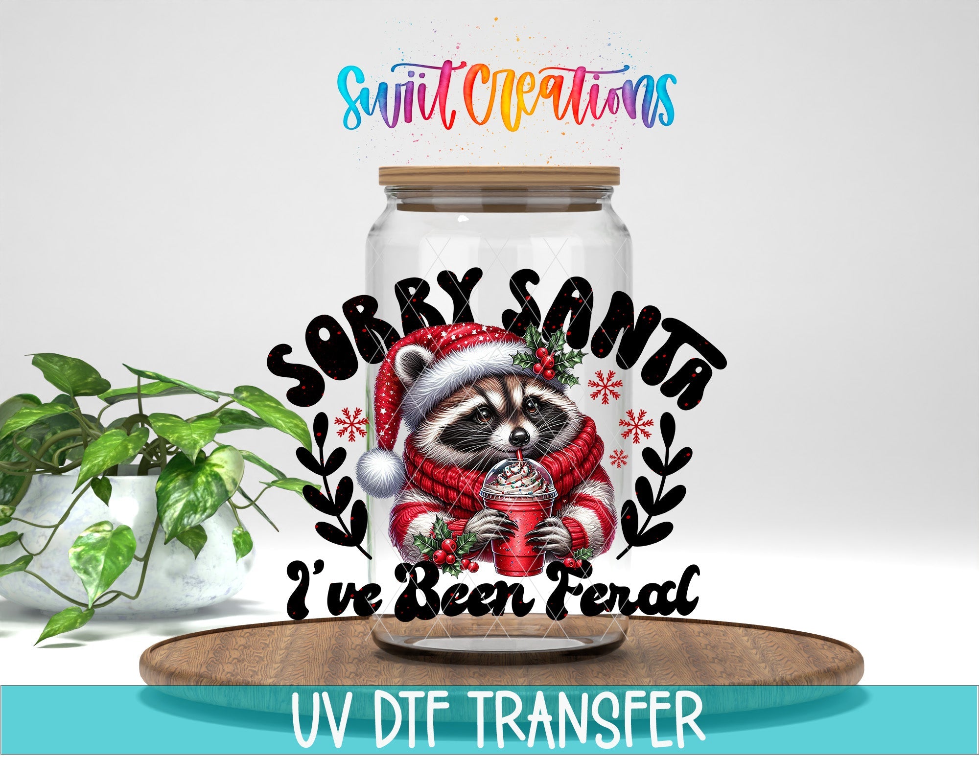 Swiit Creations UV DTF Feral Raccoon Christmas transfer displayed on a clear jar mockup
