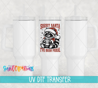 Sorry Santa I've Been Feral UV DTF transfer on white 40 oz tumblers