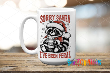 Sorry Santa I've Been Feral UV DTF transfer on a white ceramic coffee mug