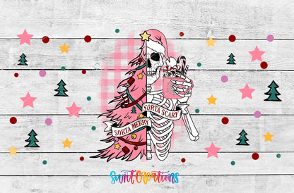 Sorta Merry Sorta Scary pink tree skeleton UV DTF wrap artwork on a white wood background