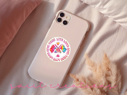 Spin Toss Live Love sticker on a pink phone case