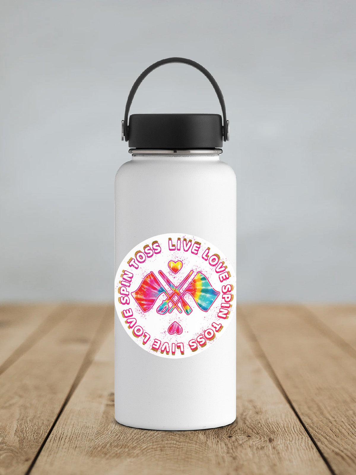 Spin Toss Live Love sticker on a white insulated water bottle