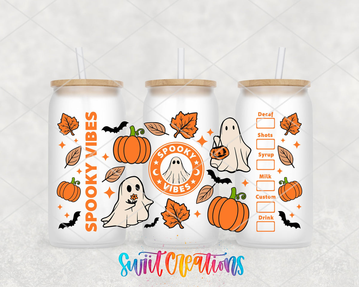 Spooky Vibes ghost coffee badge and pumpkins UV DTF wrap on three frosted glass cans