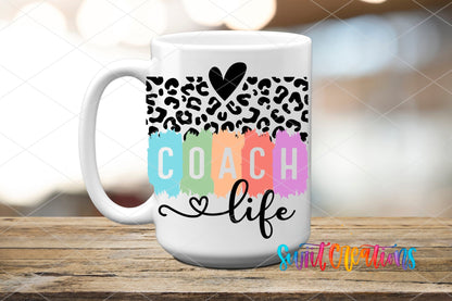 Sport Coach Life Leopard UV DTF transfer displayed on a white ceramic mug from Swiit Creations