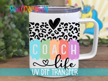 Sport Coach Life Leopard UV DTF transfer displayed on a white coffee mug from Swiit Creations