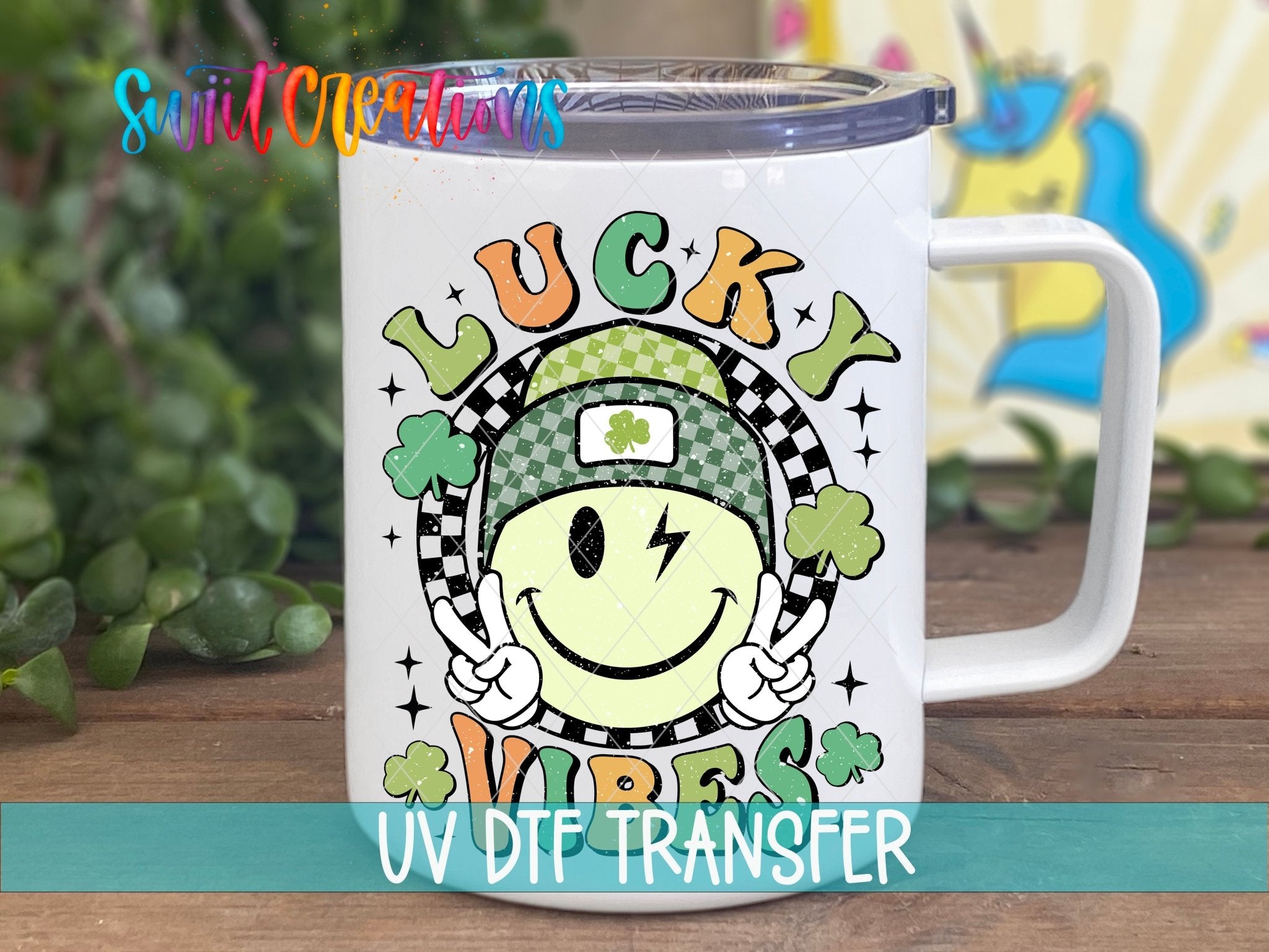 St Patricks Lucky Vibes UV DTF transfer displayed on a white coffee mug from Swiit Creations