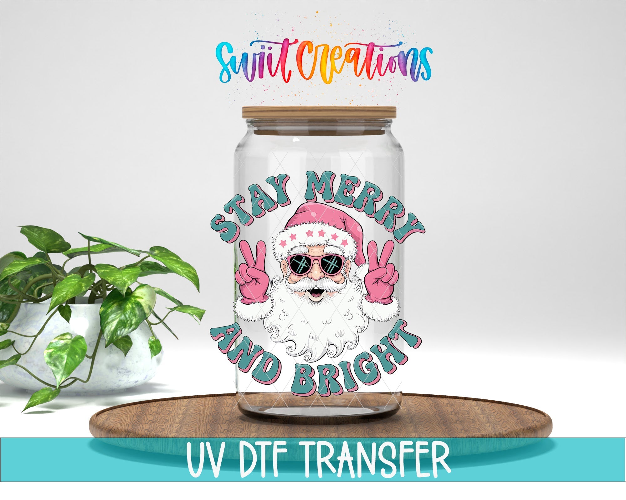 Swiit Creations UV DTF Stay Merry and Bright Santa transfer displayed on a clear jar mockup