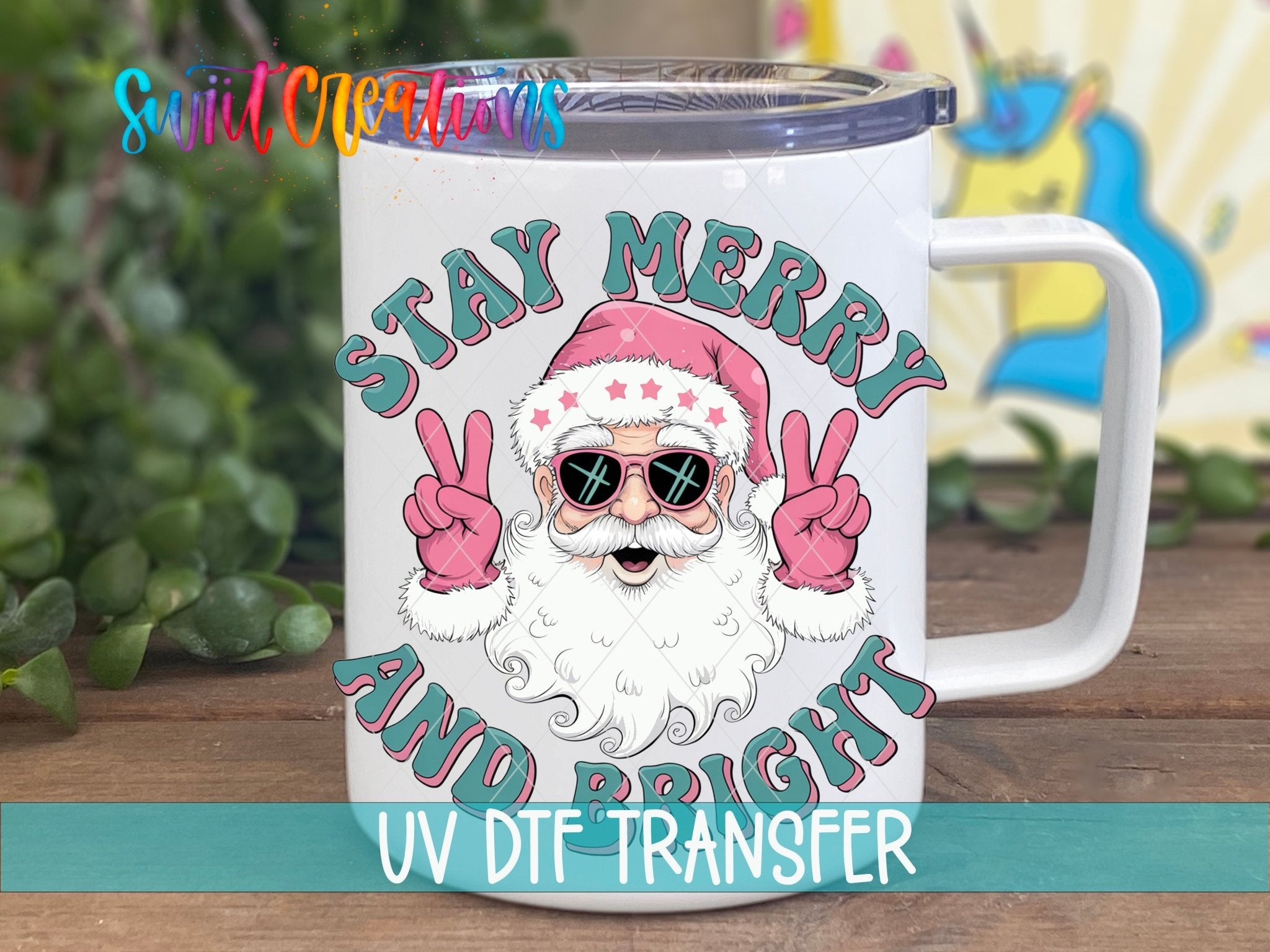 Swiit Creations UV DTF Stay Merry and Bright Santa transfer displayed on a white coffee mug
