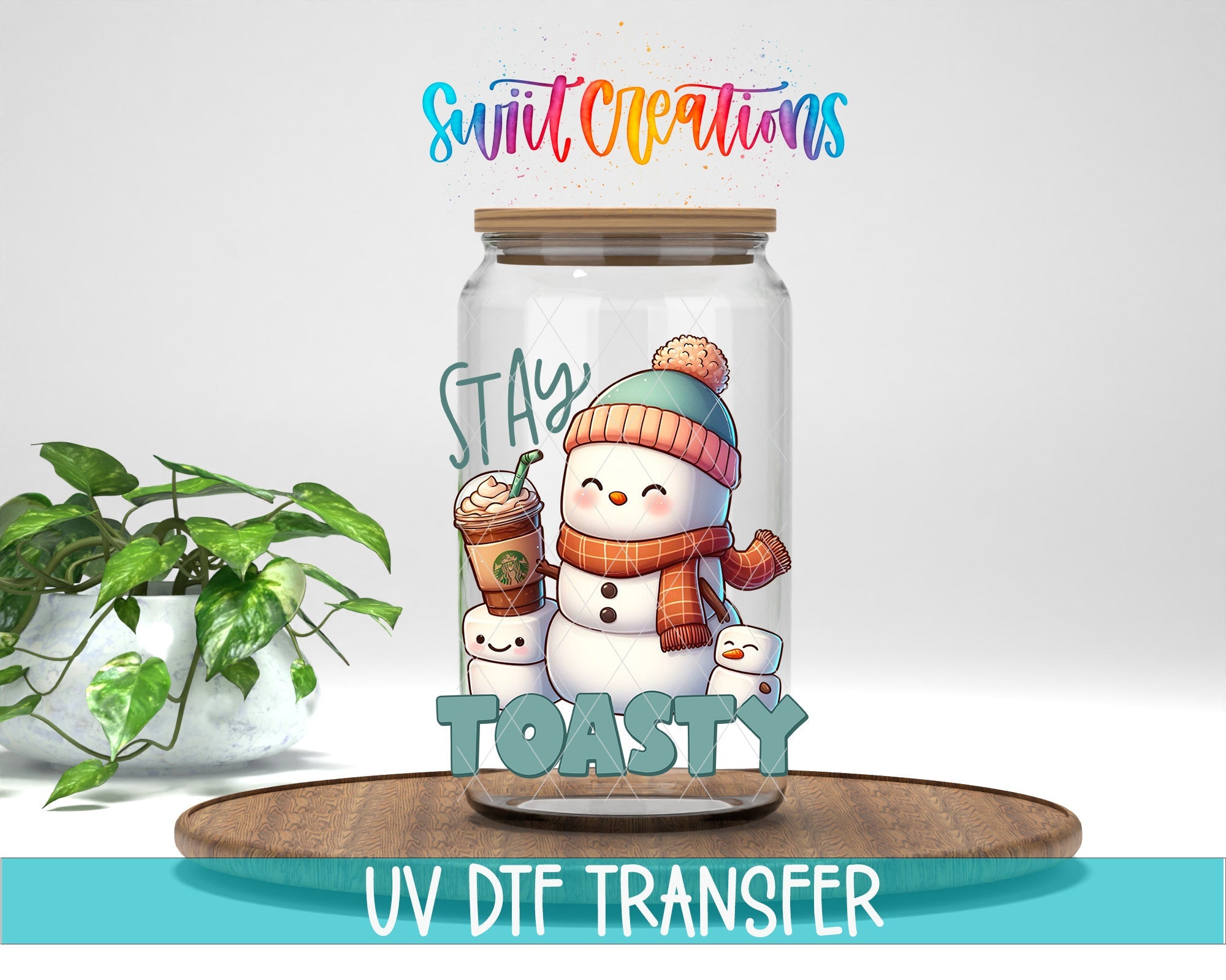 Swiit Creations UV DTF Stay Toasty Snowman Coffee Christmas transfer displayed on a clear jar mockup