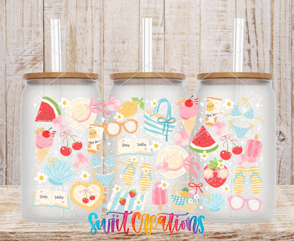 Summer Beach UV DTF wrap on three clear glass cans with bamboo lids