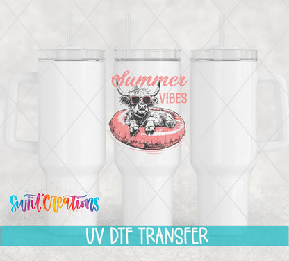 Summer Vibes highland cow on a pink float UV DTF transfer on white 40 oz tumblers