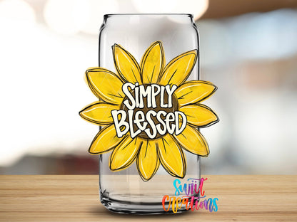 Close-up of the Simply Blessed UV DTF transfer on a clear glass can