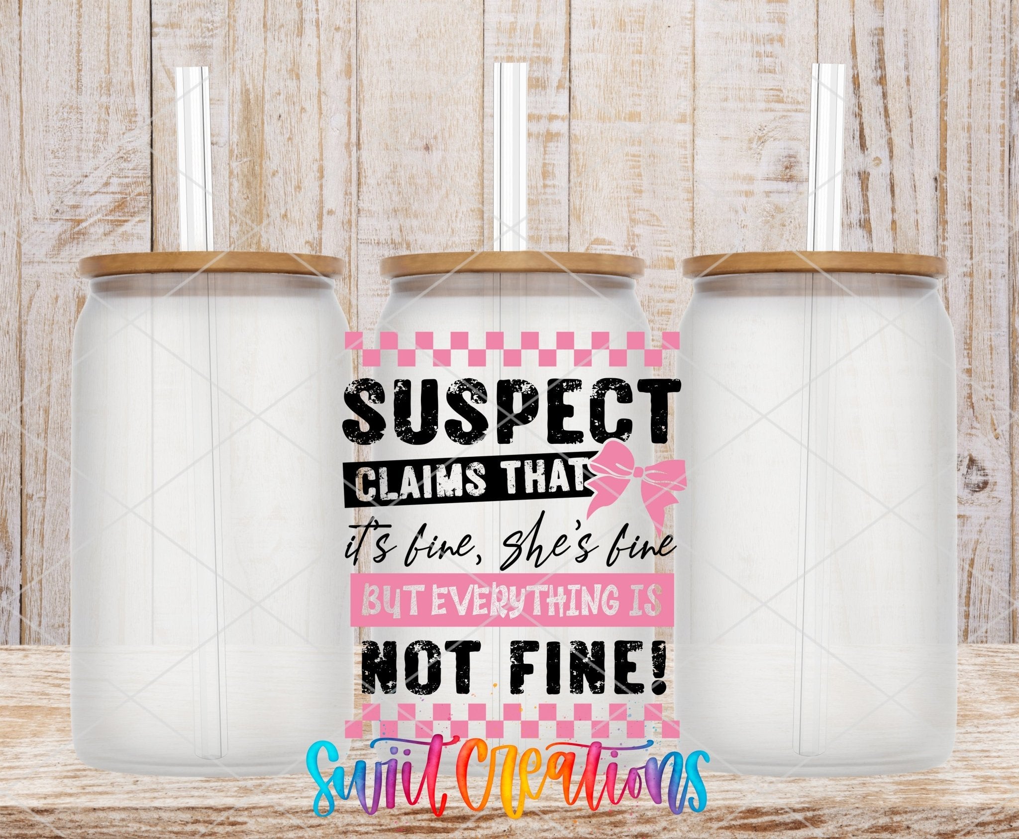 Suspect Claims She’s Fine UV DTF transfer applied to a clear glass can set from Swiit Creations