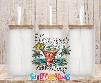 Tanned and Tipsy tropical cocktail UV DTF transfer on frosted glass cans with bamboo lids