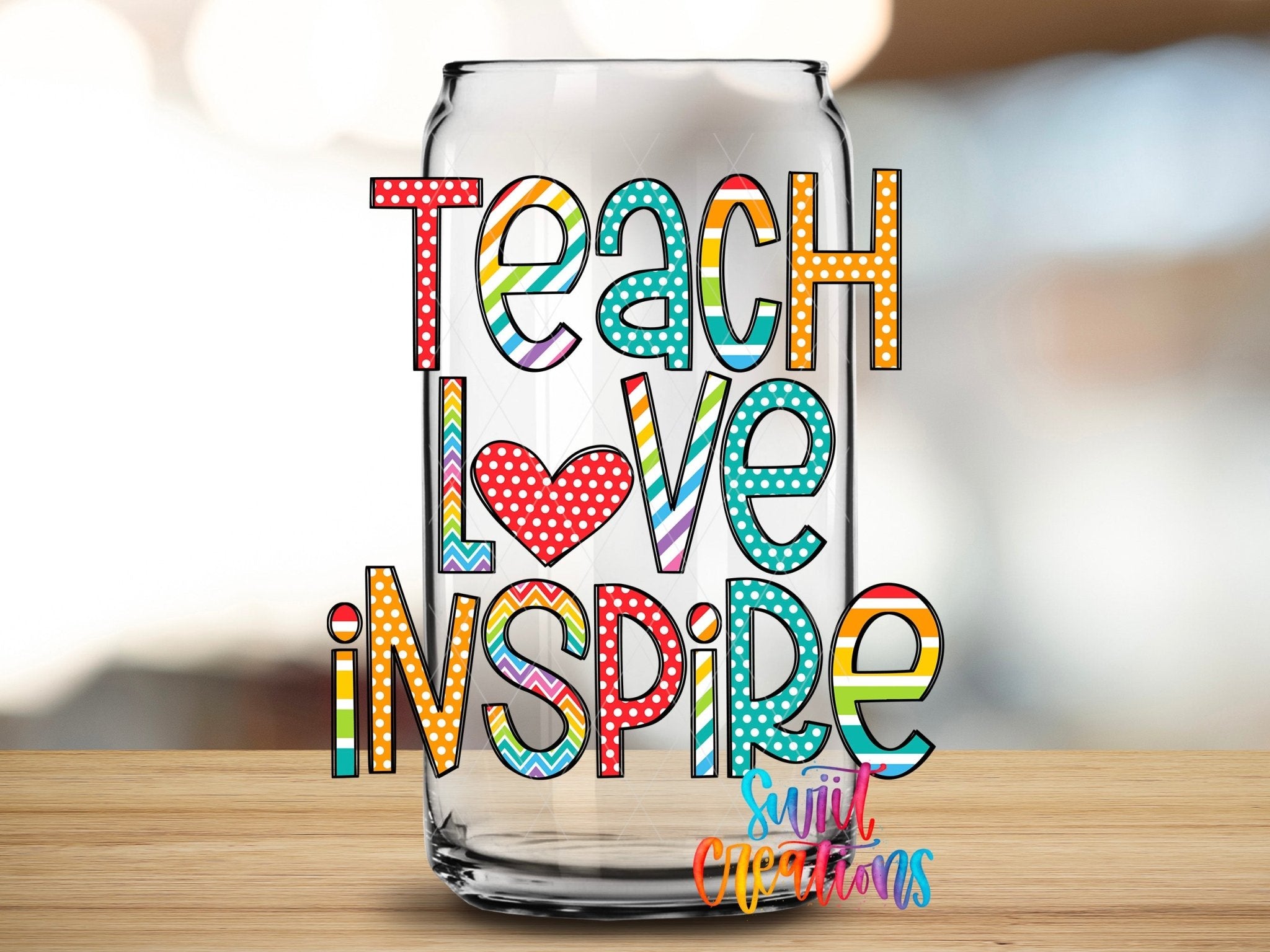 Swiit Creations UV DTF Teach Love Inspire transfer applied to a clear glass can