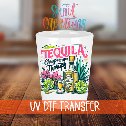 Tequila Cheaper Than Therapy shot glass transfer on a white shot glass on a wooden table
