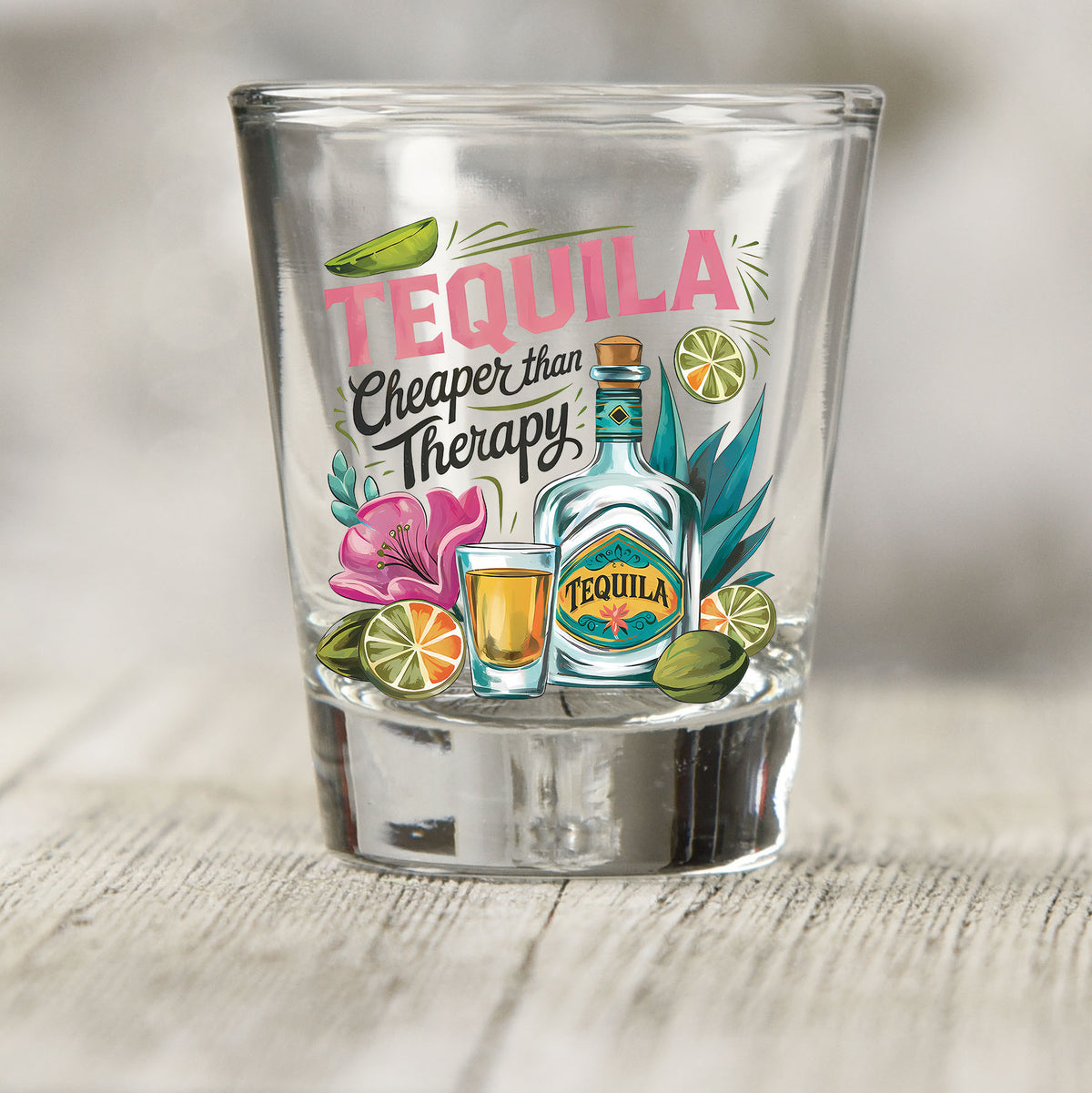 Tequila Cheaper Than Therapy shot glass UV DTF transfer with teal tequila bottle, shot glass, and lime details on a clear shot glass