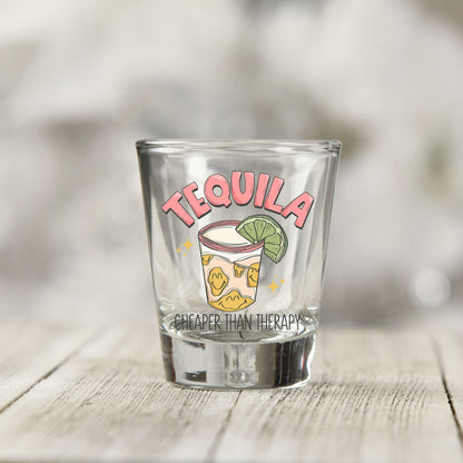 Close-up of the Tequila Cheaper Than Therapy UV DTF transfer on a clear shot glass