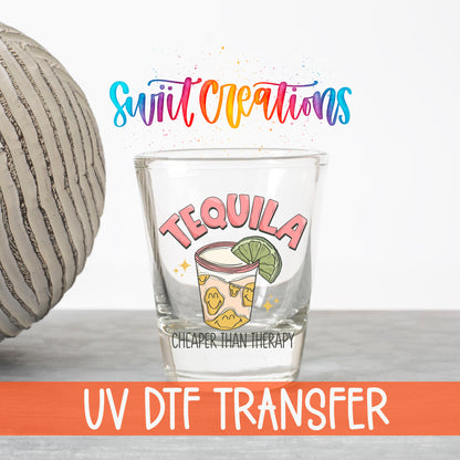 Tequila Cheaper Than Therapy UV DTF transfer on a clear shot glass with the Swiit Creations logo and UV DTF Transfer banner