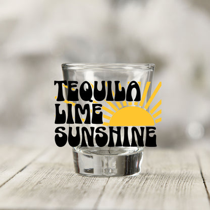 Close-up of the Tequila Lime Sunshine UV DTF transfer on a clear shot glass