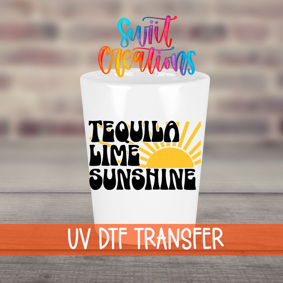 Tequila Lime Sunshine UV DTF transfer on a white shot glass in front of a brick wall