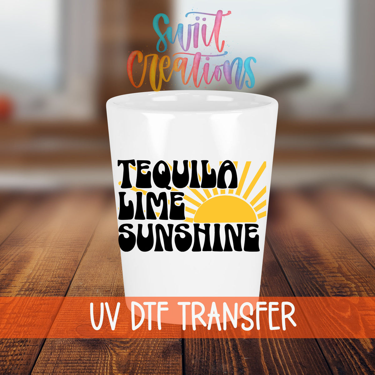 Tequila Lime Sunshine shot glass transfer on a white shot glass on a wooden table