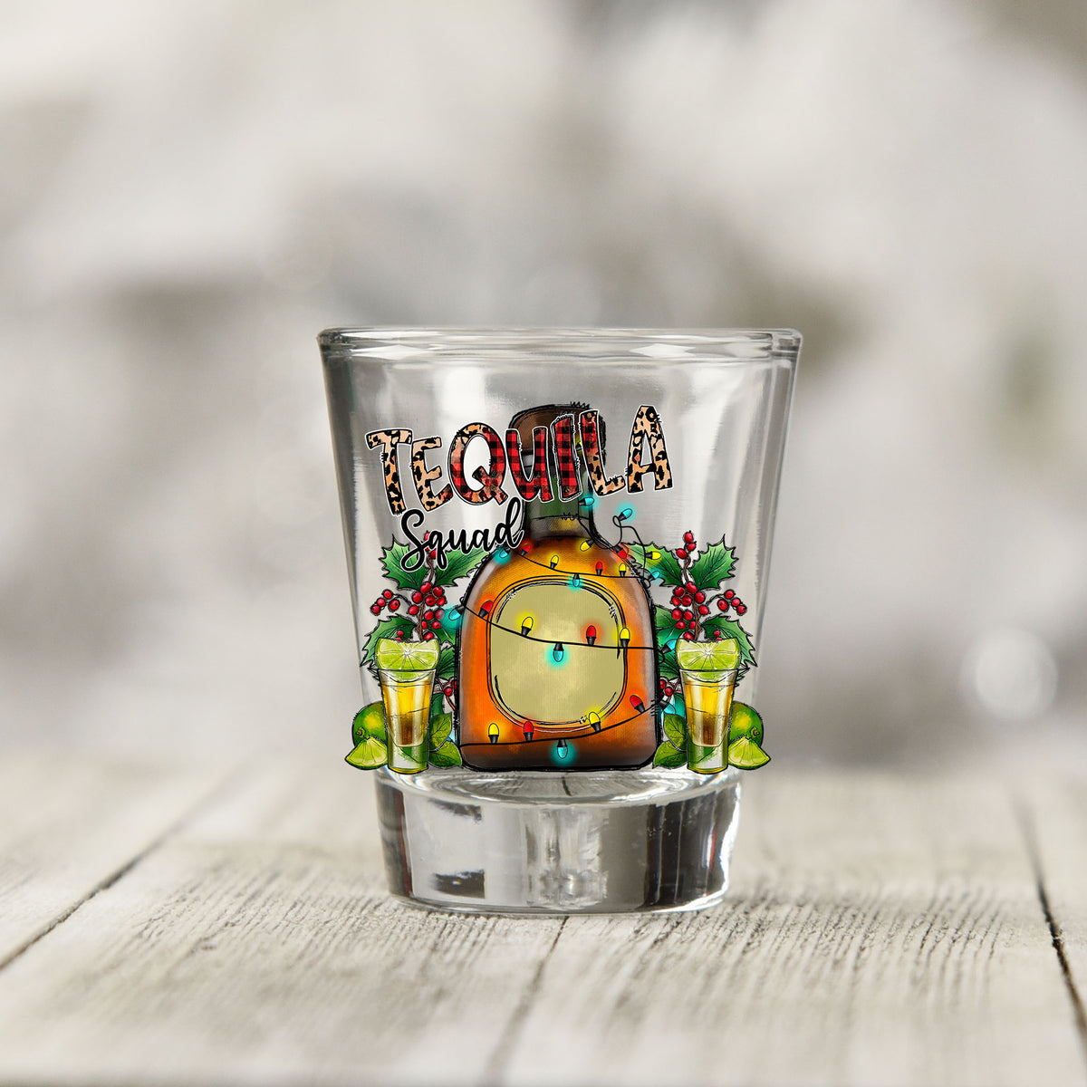 Close-up of the Tequila Squad UV DTF transfer on a clear shot glass