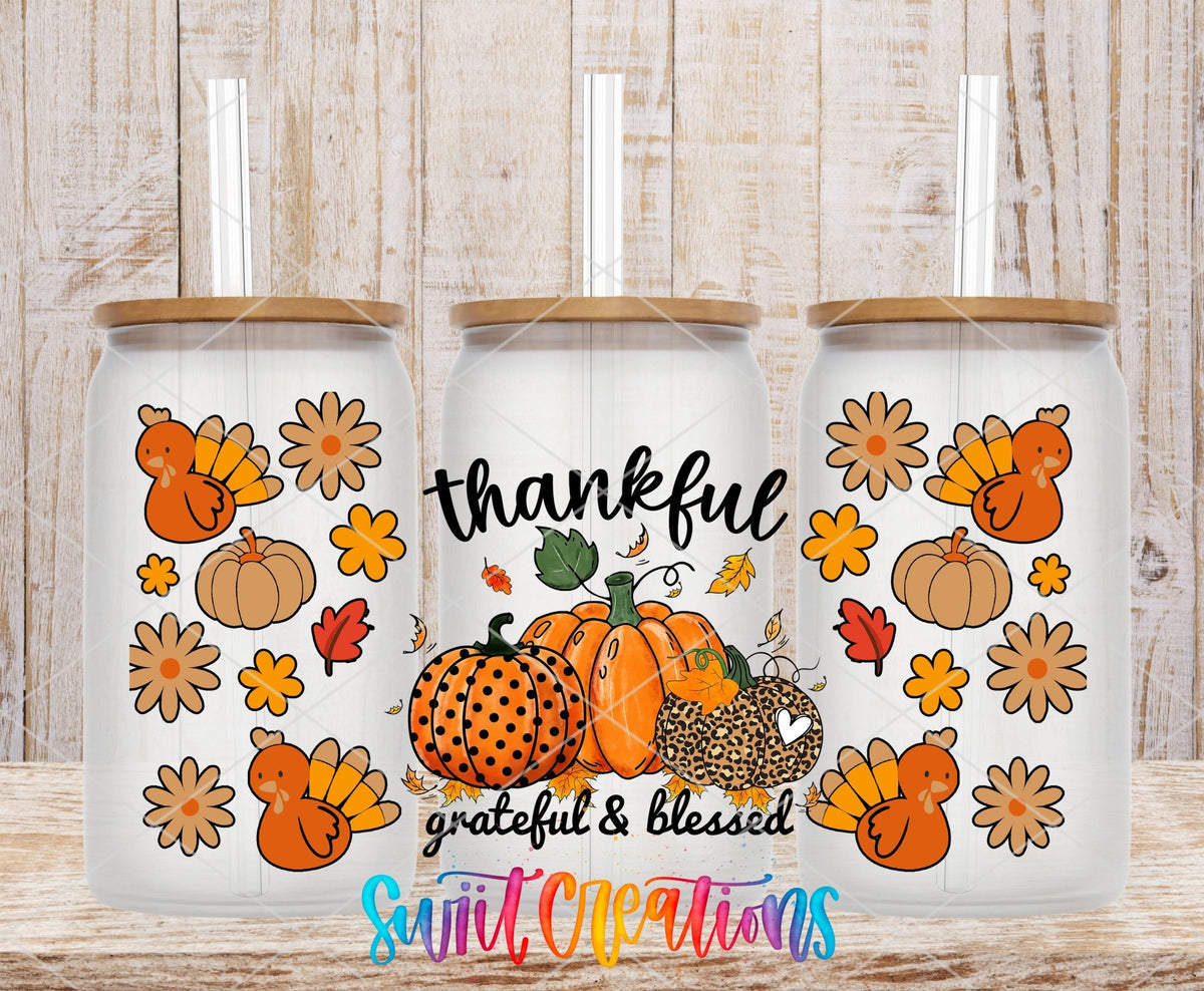 Thankful Grateful and Blessed UV DTF full wrap on three clear glass cans with bamboo lids