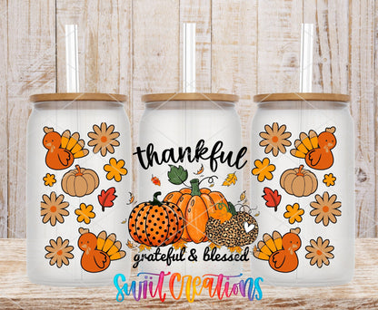 Thankful Grateful and Blessed UV DTF full wrap on three clear glass cans with bamboo lids