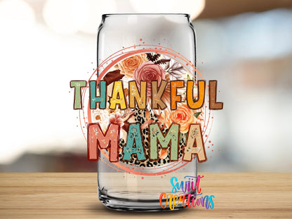 Close-up of the Thankful Mama UV DTF transfer on a clear glass can