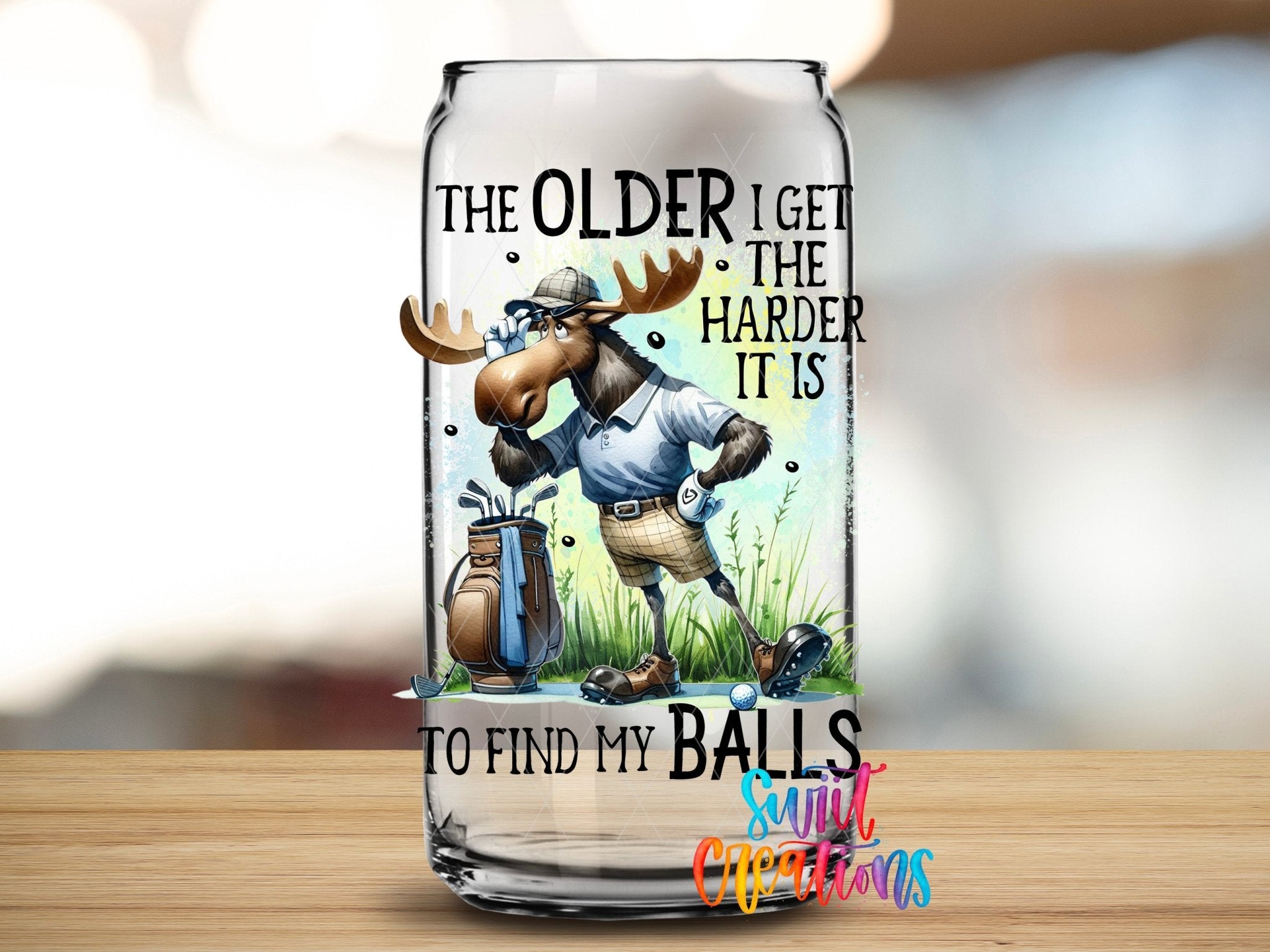 Swiit Creations UV DTF Older I Get Finding My Balls transfer applied to a clear glass can