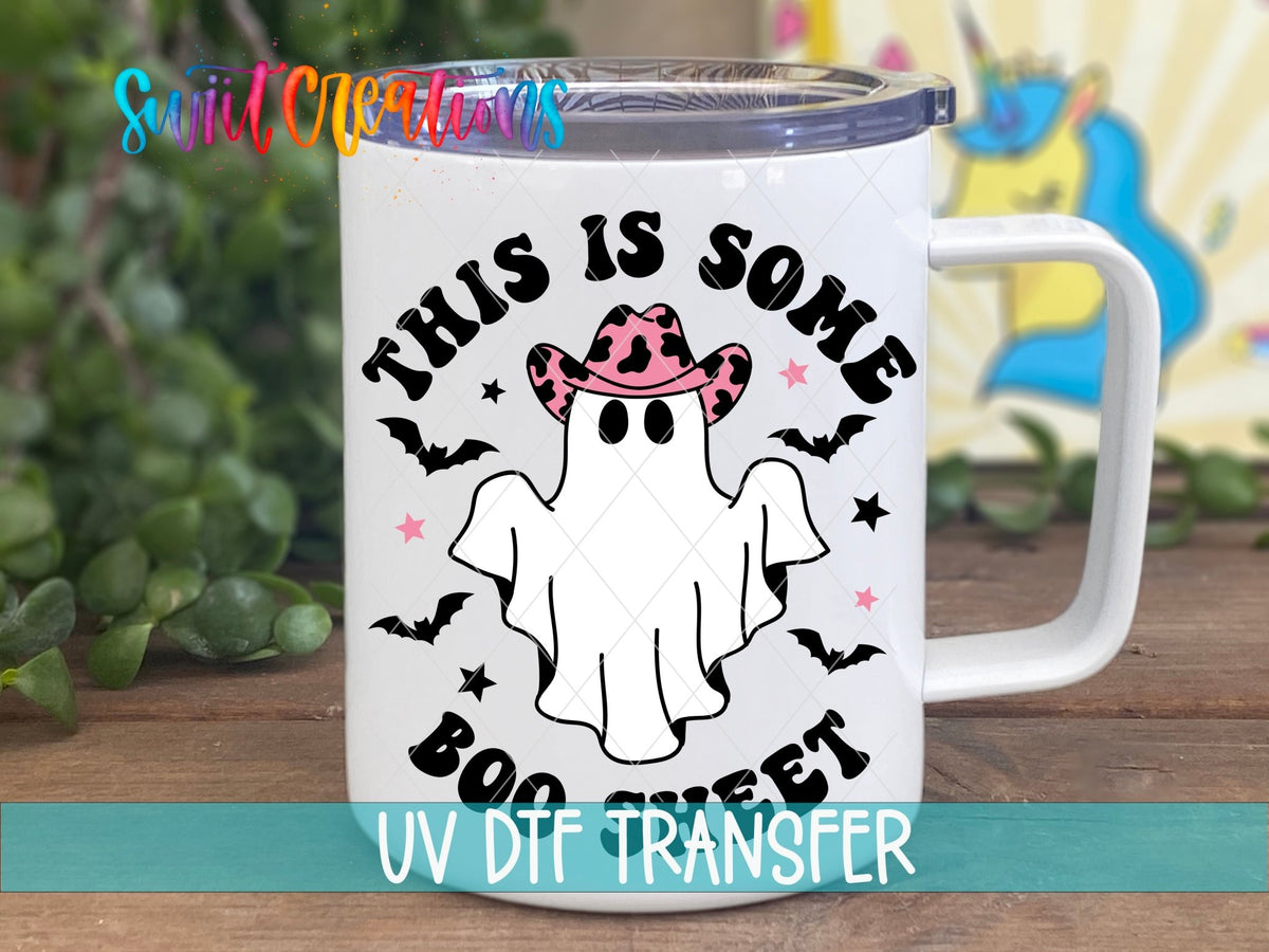 This Is Some Boo Sheet UV DTF transfer on a white stainless steel mug with a lid