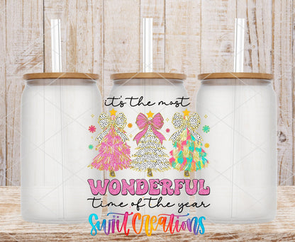 It's the Most Wonderful Time of the Year leopard trees and bow UV DTF transfer on frosted glass cans with bamboo lids