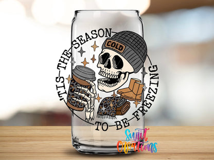 Close-up of the Tis the Season to Be Freezing UV DTF transfer on a clear glass can