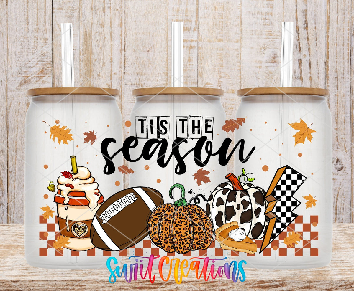 Tis the Season football, pumpkins, and pie UV DTF wrap on three clear glass cans with bamboo lids