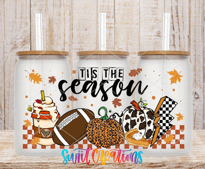 Tis the Season football, pumpkins, and pie UV DTF wrap on three clear glass cans with bamboo lids