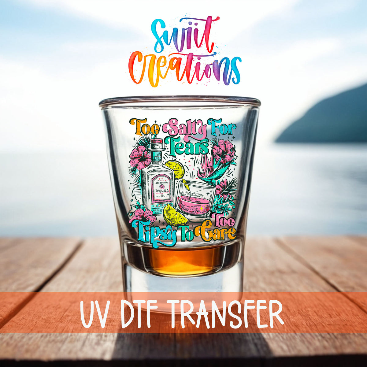Too Salty For Tears Too Tipsy To Care shot glass UV DTF transfer on a filled shot glass on a dock by the water