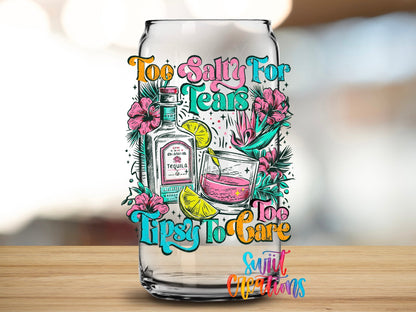 Close-up of the Too Salty for Tears Too Tipsy to Care UV DTF transfer on a clear glass can