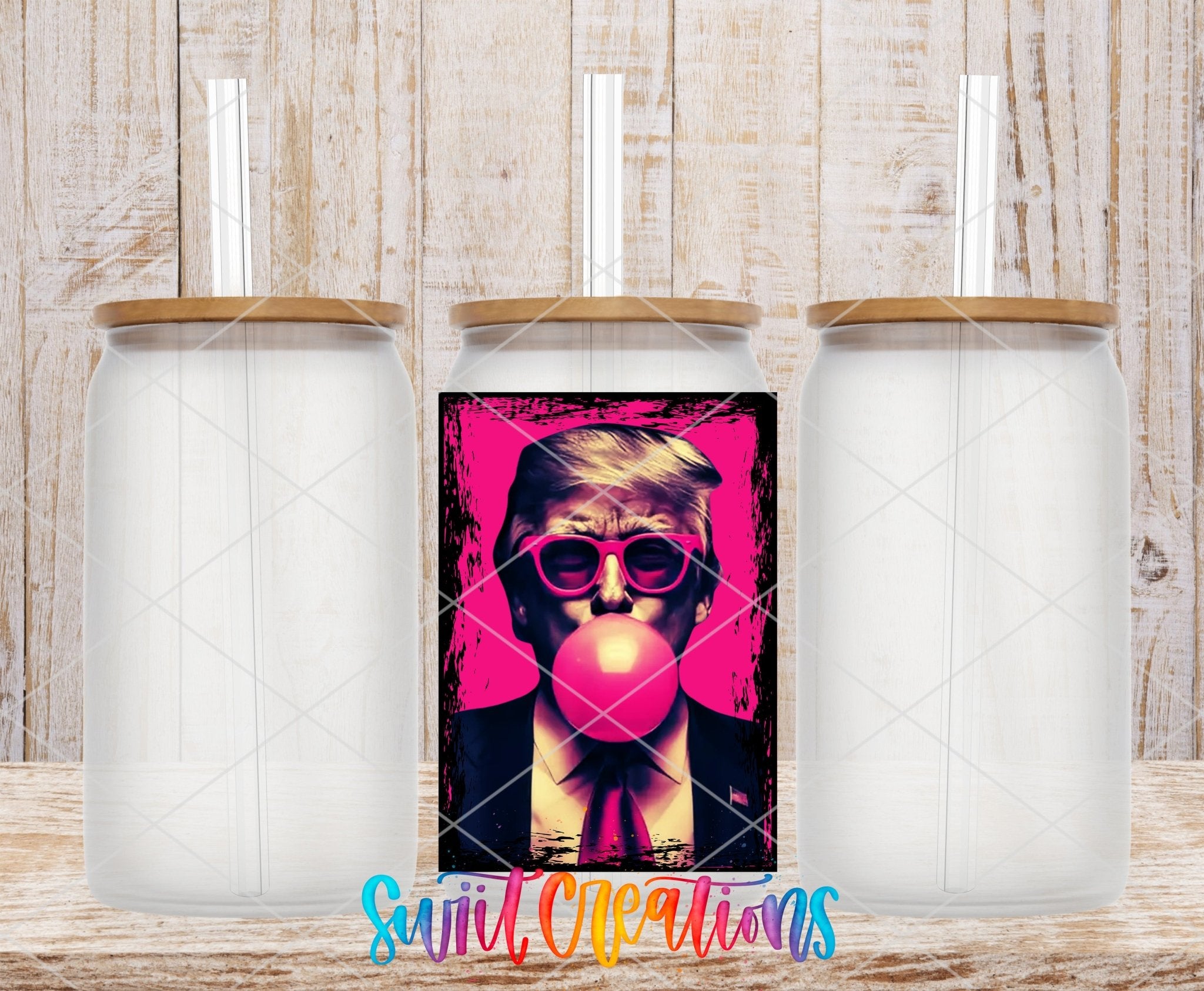 Swiit Creations UV DTF Trump transfer shown on a clear glass can set