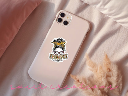 Trumpet Mom sticker on a pink phone case