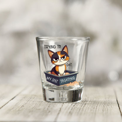 Close-up of the Trying to Get My Sh*t Together UV DTF transfer on a clear shot glass
