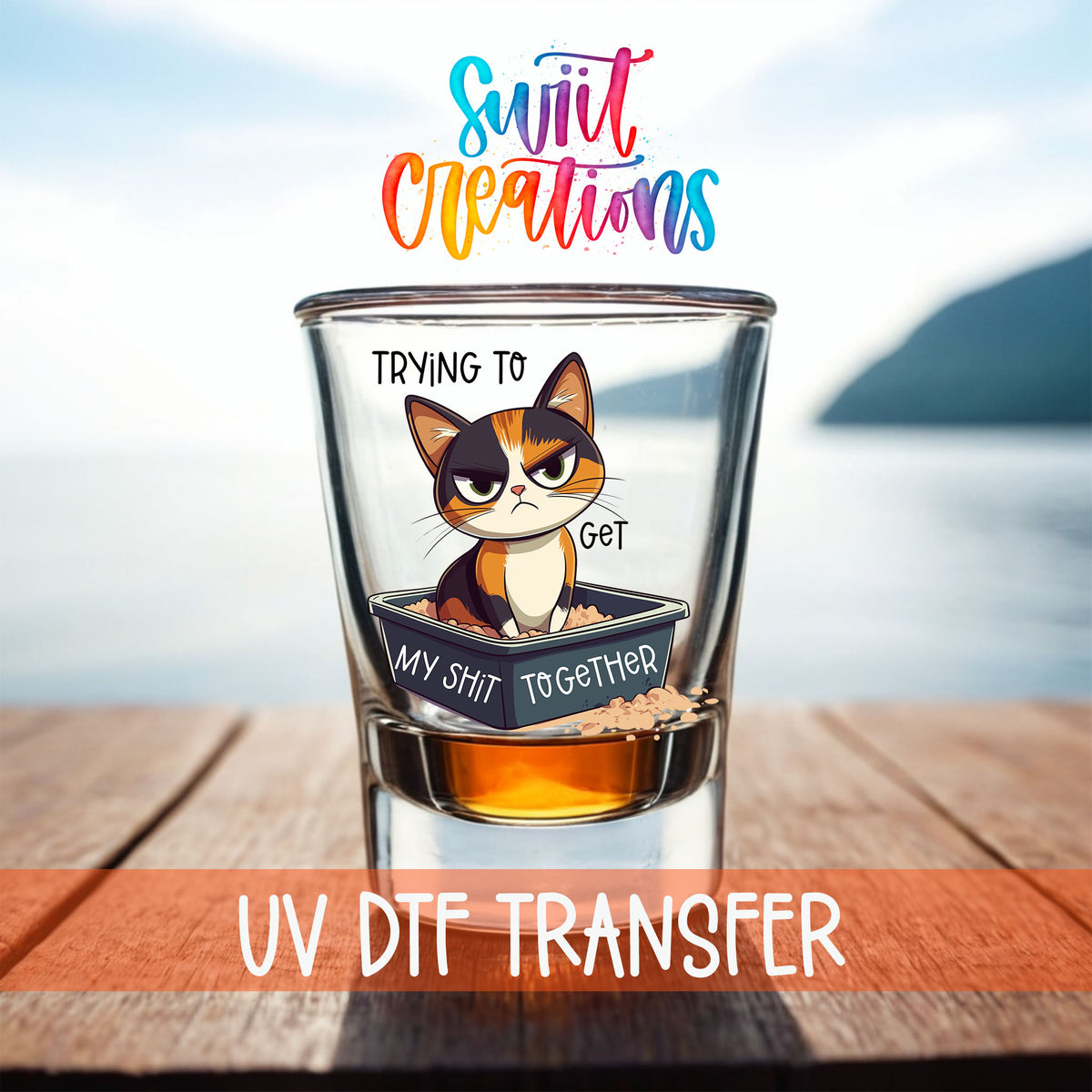 Trying to Get My Sh*t Together shot glass UV DTF transfer on a filled shot glass on a dock by the water