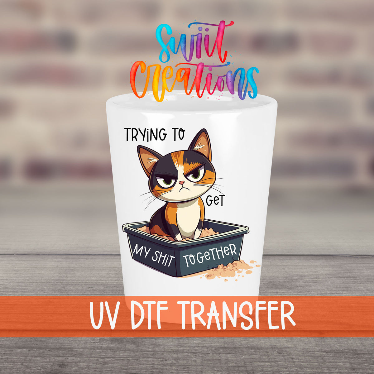 Trying to Get My Sh*t Together UV DTF transfer on a white shot glass in front of a brick wall