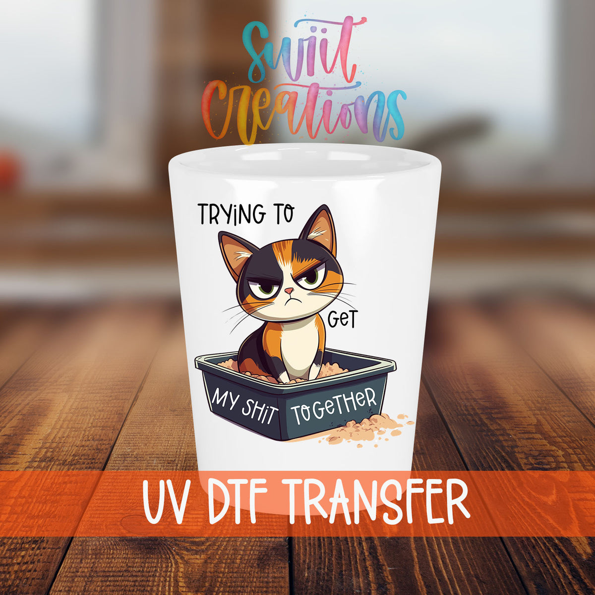 Trying to Get My Sh*t Together shot glass transfer on a white shot glass on a wooden table