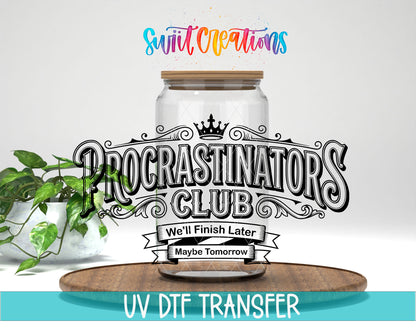 Procrastinators Club We'll Finish Later UV DTF transfer displayed on a clear glass jar