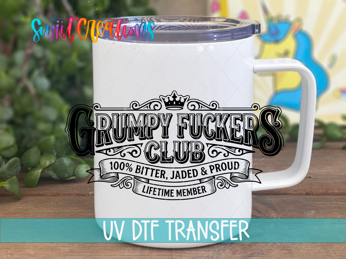 Grumpy Fuckers Club UV DTF transfer displayed on a white handled travel mug