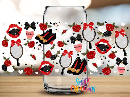Close-up of the Red Lips and Roses UV DTF full wrap on a clear glass can