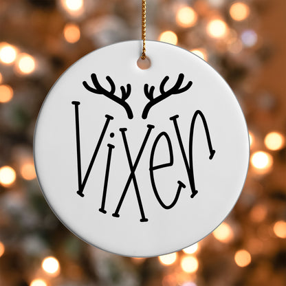 Vixen Reindeer Name ornament UV DTF transfer on a round white ornament with a bokeh light background