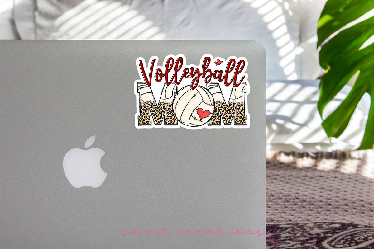 Volleyball Mom sticker on the lid of a silver laptop